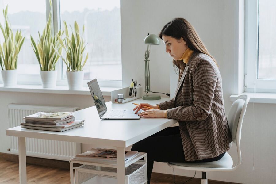 Student working at a bright desk